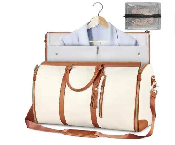 Voyager Travel Bag with cream and brown design, multiple compartments, and detachable strap.