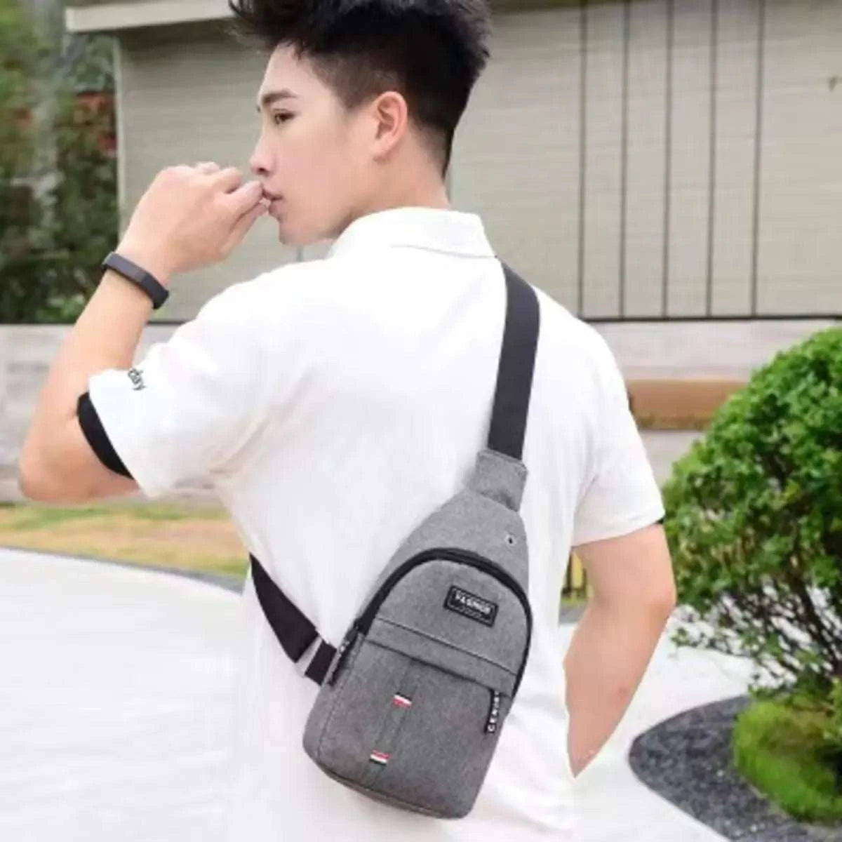 Large messenger bag for men, stylish and functional canvas accessory.