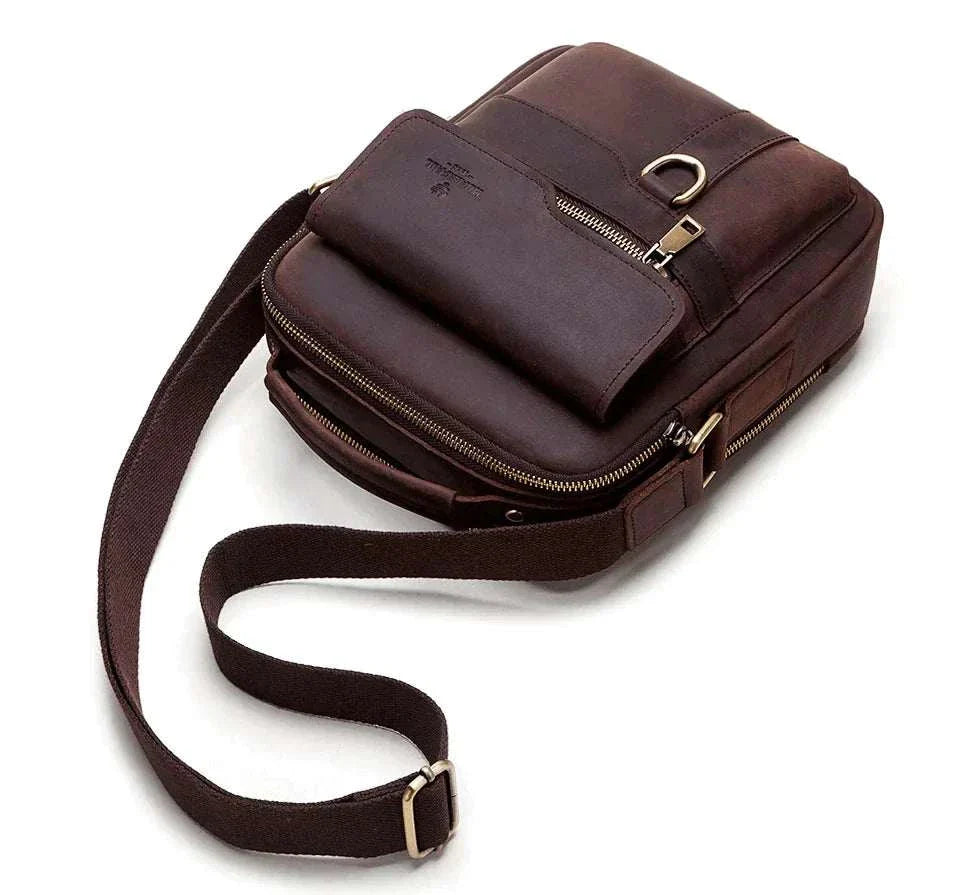 Vintage leather messenger bag with distressed finish and adjustable strap.