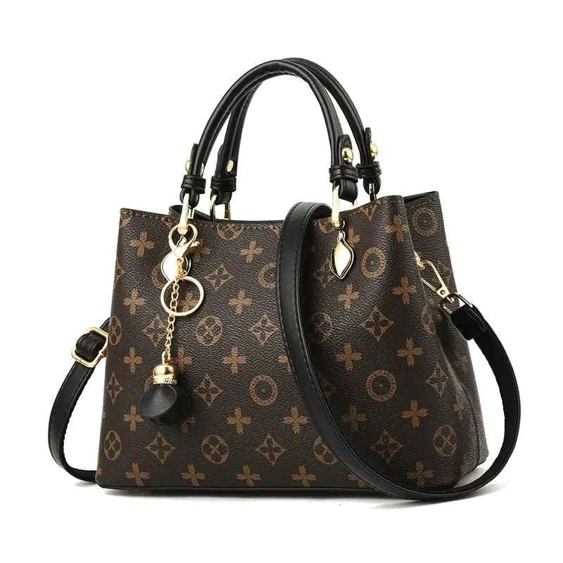 Stylish tote bag with elegant pattern and detachable strap.