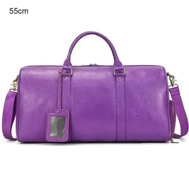 Purple genuine leather travel bag with multiple compartments and padded straps, 55cm.