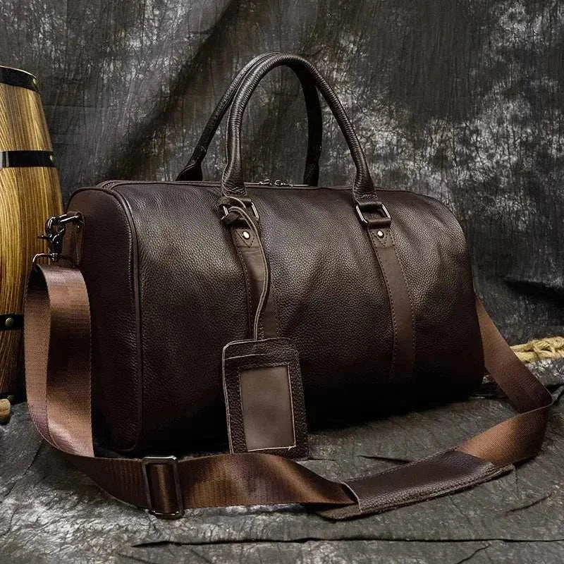 Genuine leather travel bag with luxurious finish and spacious interior.